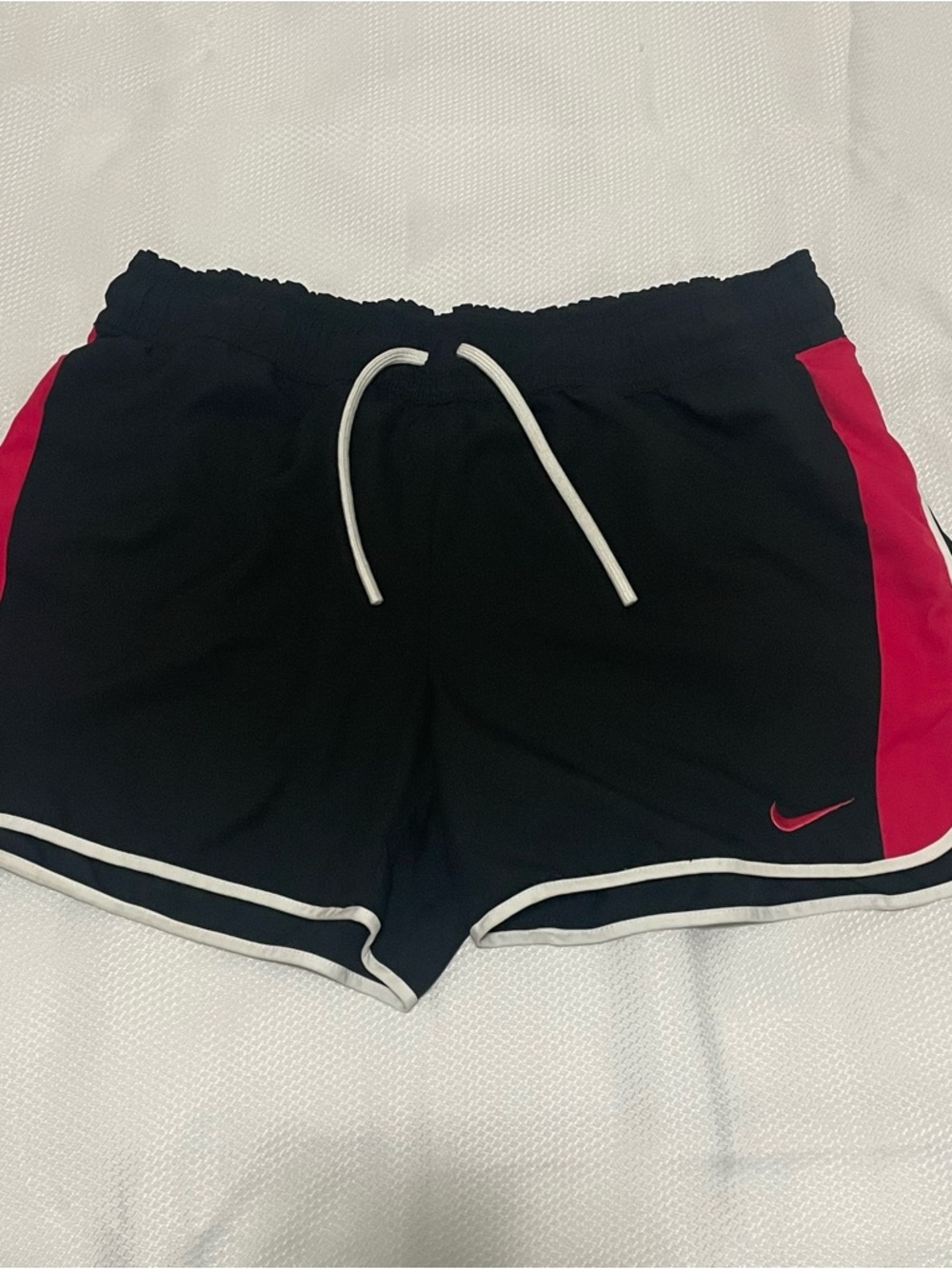 Nike Black Athletic Shorts with Pink Side Panels and White Trim